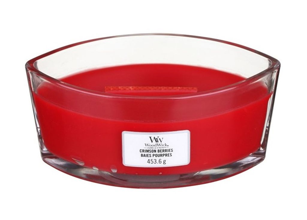 A red WoodWick candle in a clear glass container.