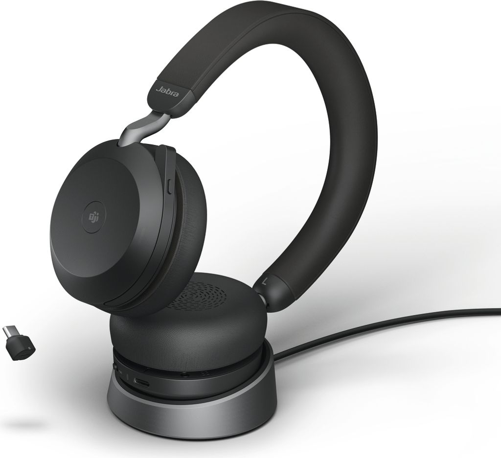 A black Jabra Evolve2 75 headset is shown on its charging stand against a white background.