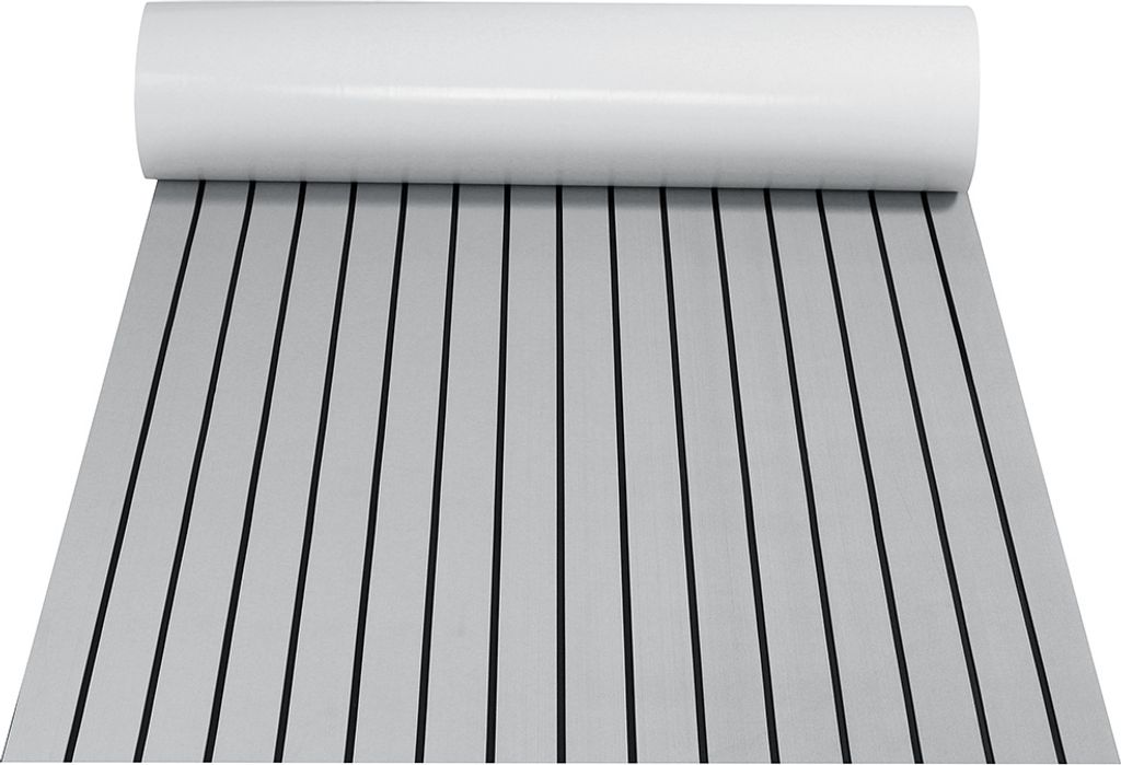 A roll of grey EVA foam flooring with black lines, designed for boats or yachts, is unrolled on a white surface.