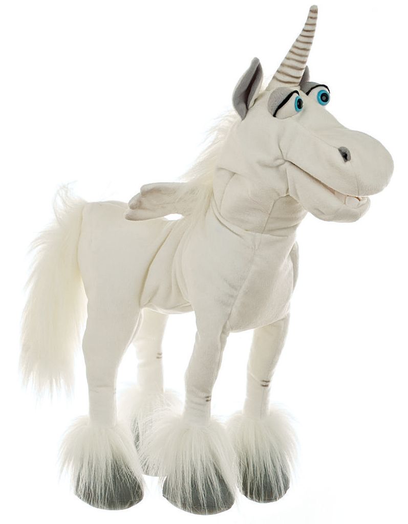 A stuffed unicorn toy standing on a white background.