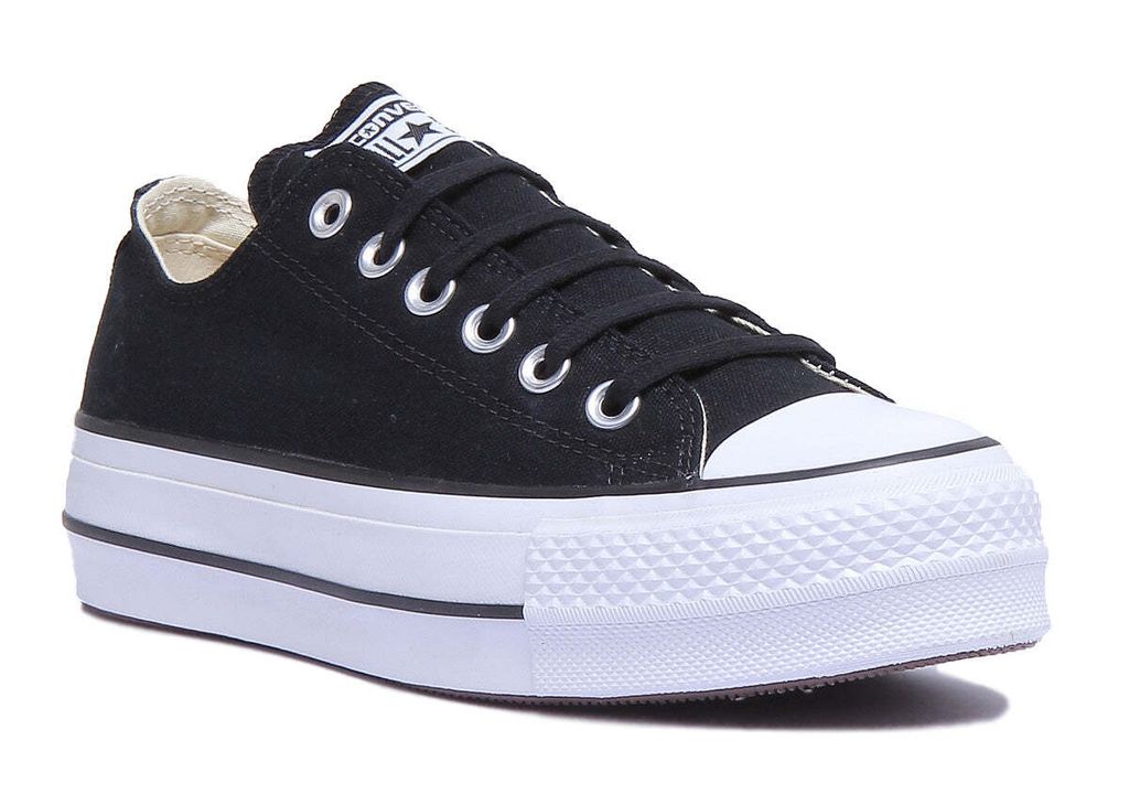 A studio shot of a black Converse platform sneaker.