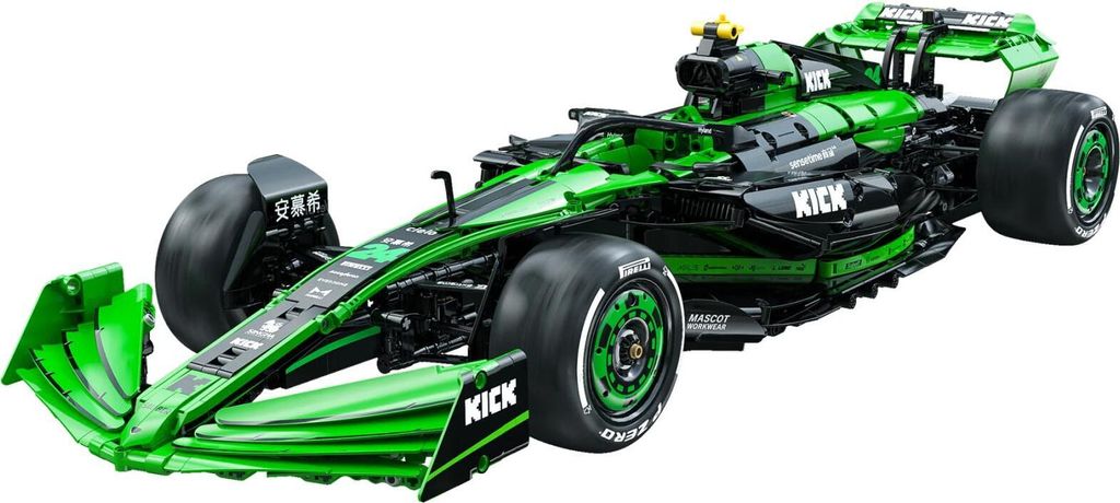 A green and black Formula 1 race car model.