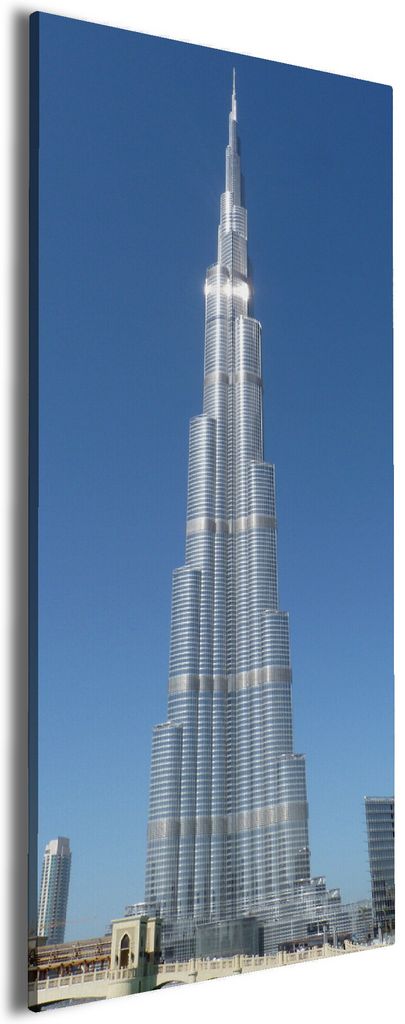 Wallario Premium Leinwandbild Wolkenkratzer in Dubai in Größe 60 x 150 cm