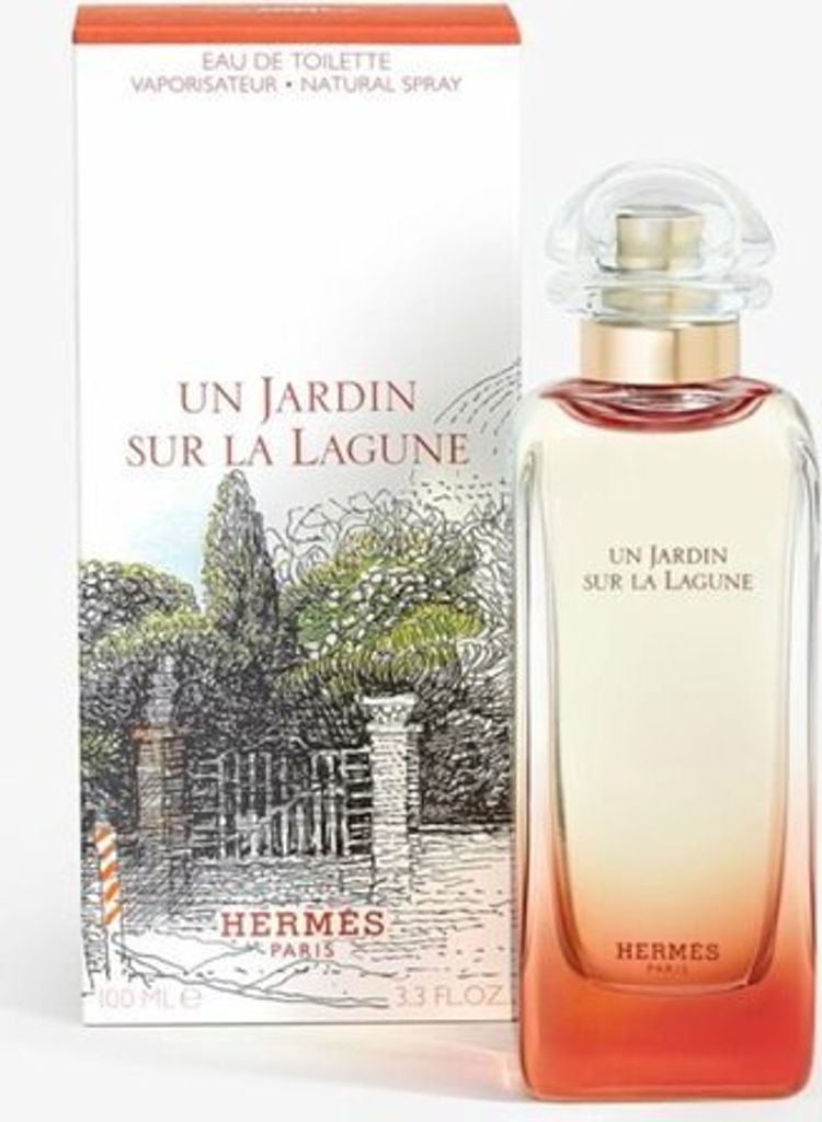 A perfume bottle and its packaging are displayed side-by-side against a white background.