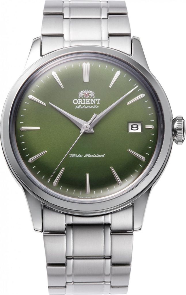 A close-up studio shot of a silver and green Orient automatic watch.