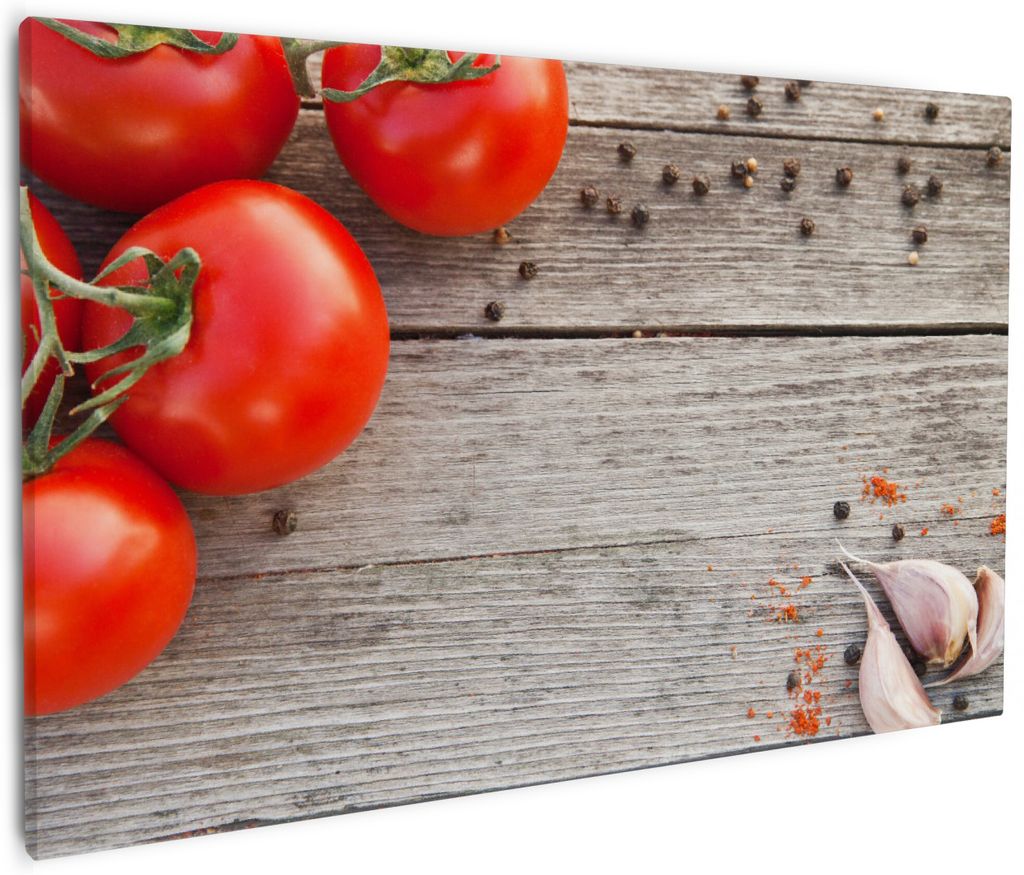 Wallario Premium Leinwandbild Tomaten und Gewürze auf altem Holztisch in Größe 60 x 90 cm
