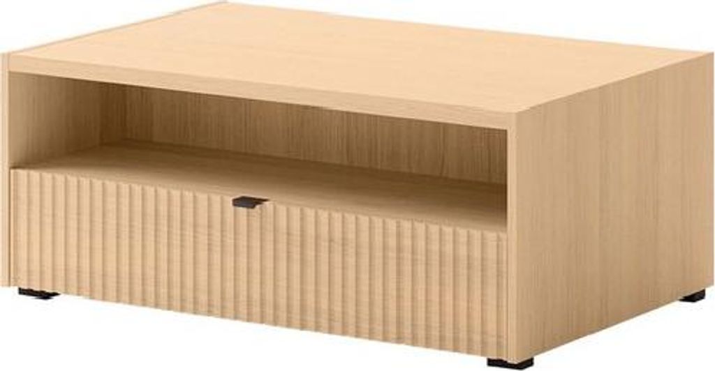 A light wood coffee table with a fluted drawer front and a single drawer.