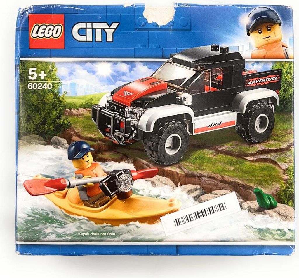 A LEGO City set featuring a truck and a kayak.