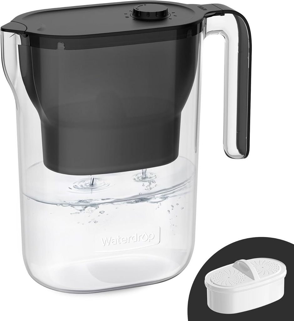 A clear water filter pitcher with a black lid and filter basket, filled with water.