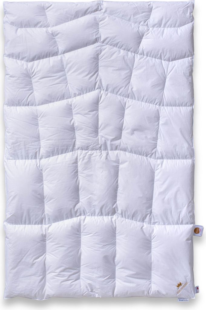 A white down comforter is laid flat on a white background.