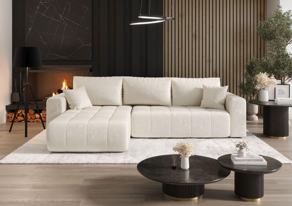 A modern living room with a sectional sofa, fireplace, and coffee tables.