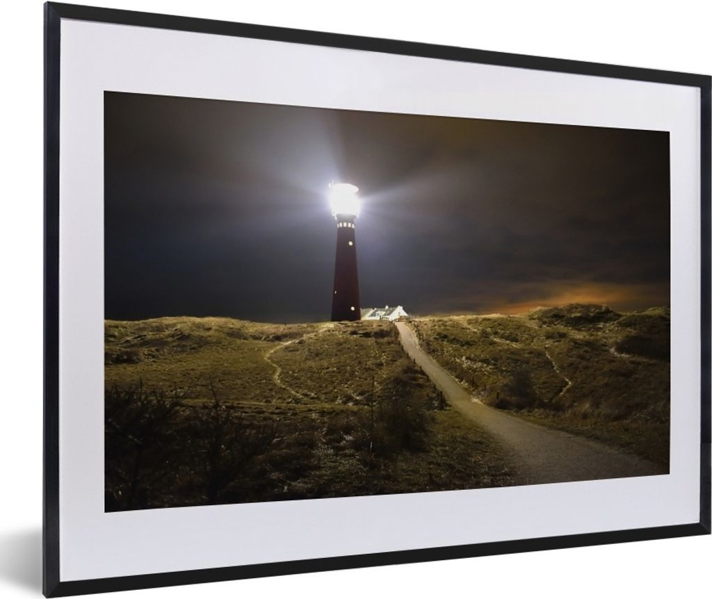 MuchoWow Gerahmtes Poster Ein beleuchteter Leuchtturm auf der Insel Schiermonnikoog 60x40 cm - Poster mit Schwarzem Bilderrahmen Wandposter Rahme...
