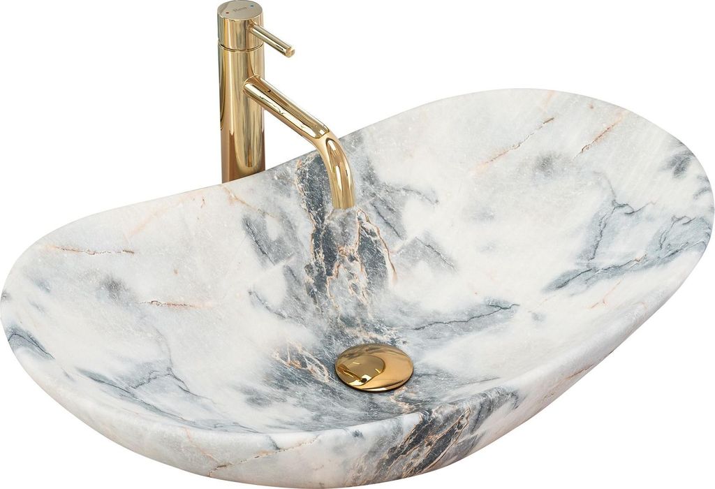 A marble basin with a gold faucet.