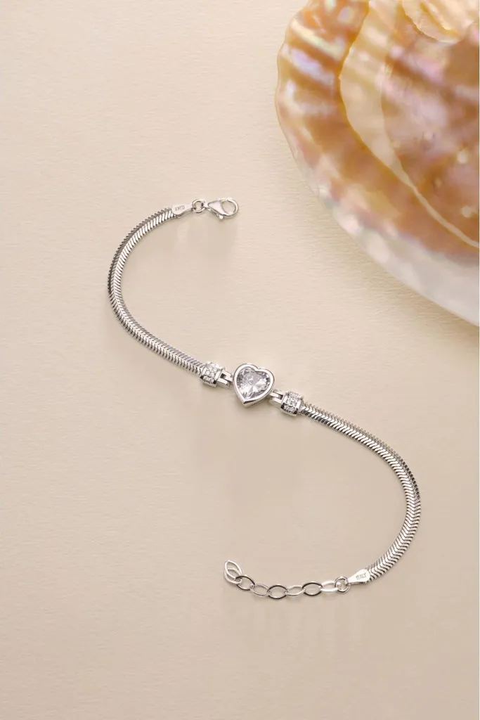 Gourmette femme en argent rhodié et son pendentif cœur scintillant