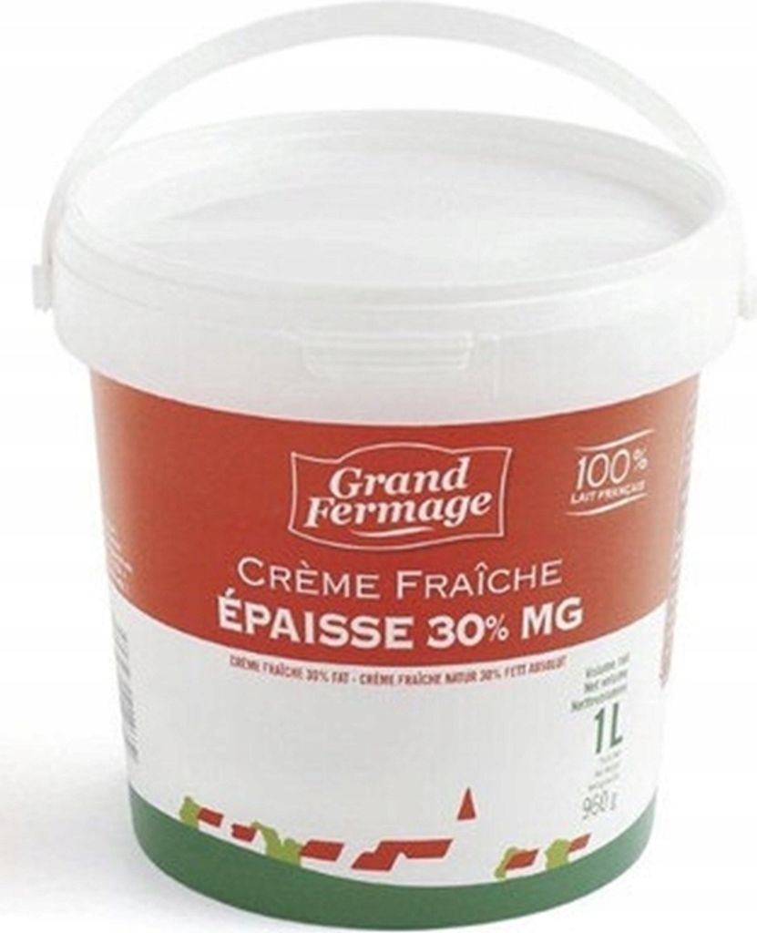 A white plastic tub of creme fraiche with a red label.