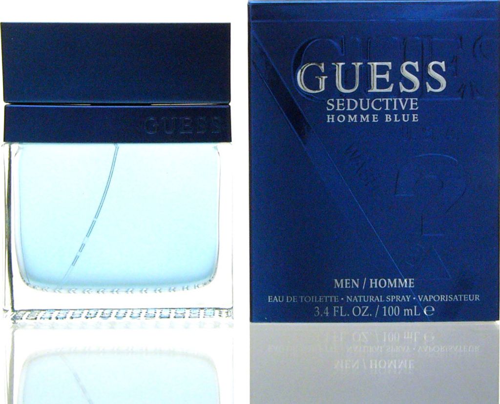 A bottle of Guess Seductive Homme Blue eau de toilette and its packaging are displayed side-by-side against a white background.