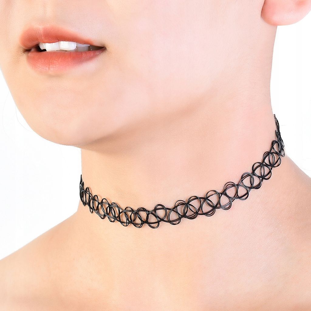 Close-up of a person wearing a black choker necklace.