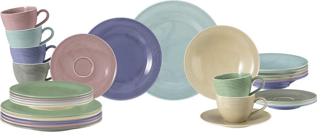 A collection of colorful ceramic plates and cups arranged on a white background.