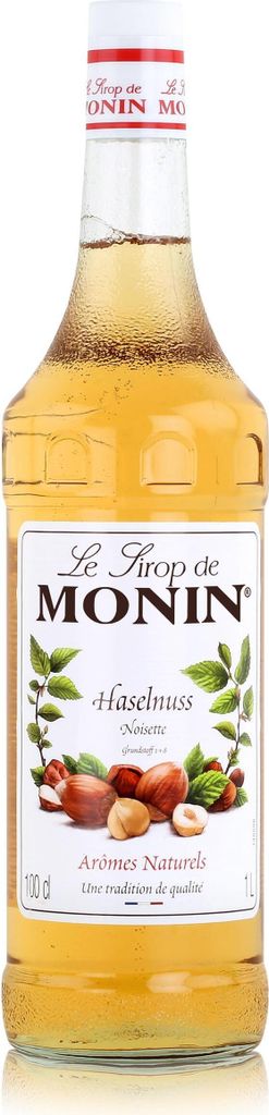 A bottle of Monin Hazelnut syrup.