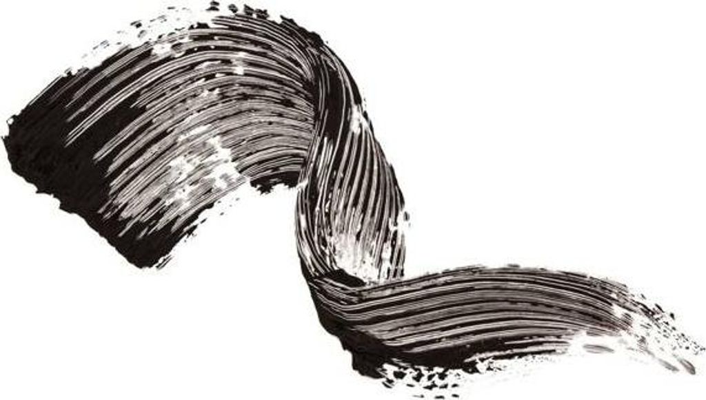 A swatch of black mascara is swirled on a white background.