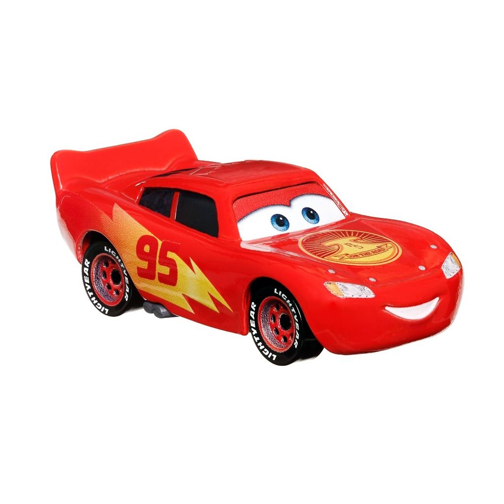 A red toy car, Lightning McQueen from Disney Pixar's Cars, is shown from a side-diagonal angle against a white background.