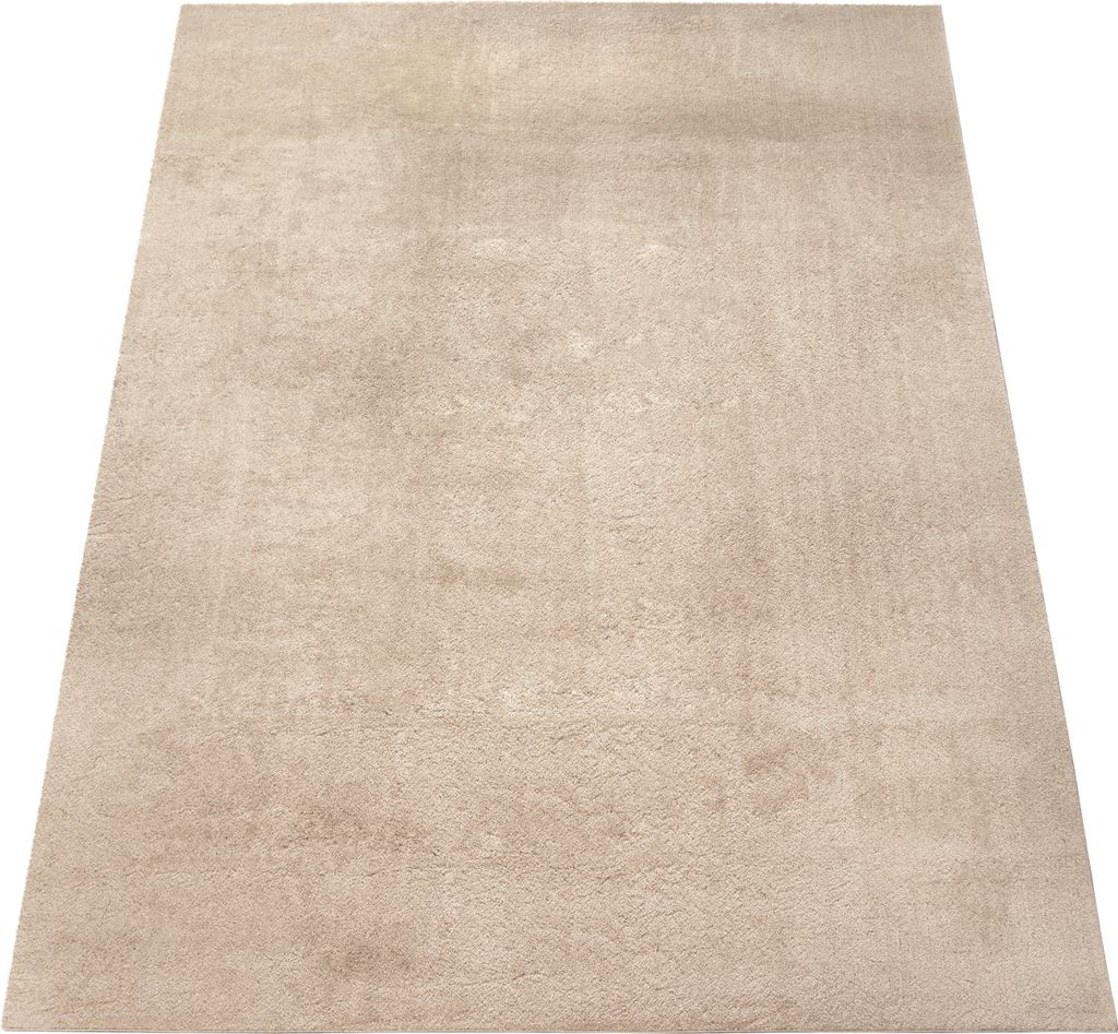 A beige rug is shown from a diagonal angle on a white background.