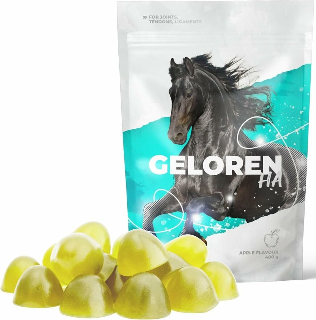 A bag of horse supplements and a pile of the supplements in front of it.
