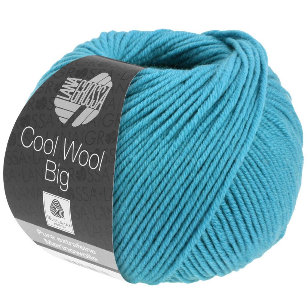 A ball of turquoise yarn with a label.