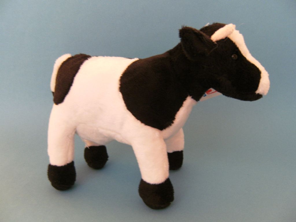 Plüschtier Kuscheltier Stoff Tier Kuh Kalb Rind schwarz weiß 23 cm 