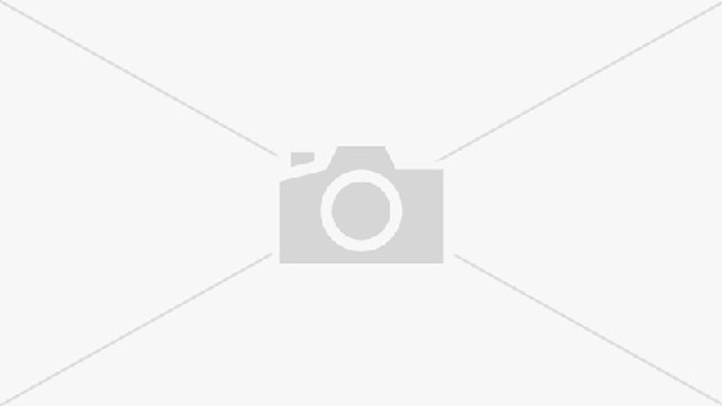 A placeholder image with a camera icon in the center.
