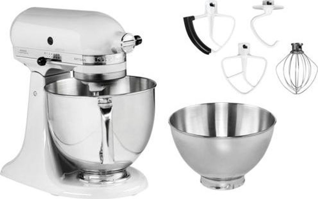 A white KitchenAid stand mixer with various attachments and a separate mixing bowl are displayed against a white background.
