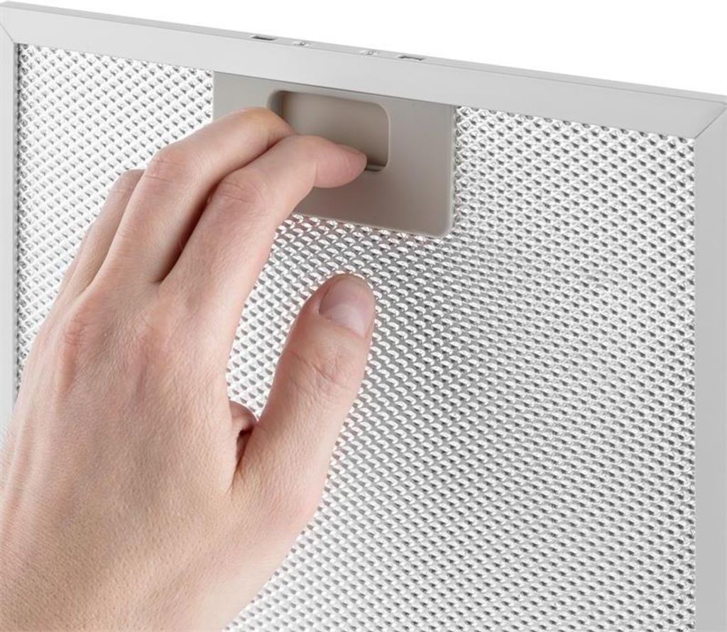 A hand is shown interacting with a metal mesh filter, likely for a kitchen appliance.