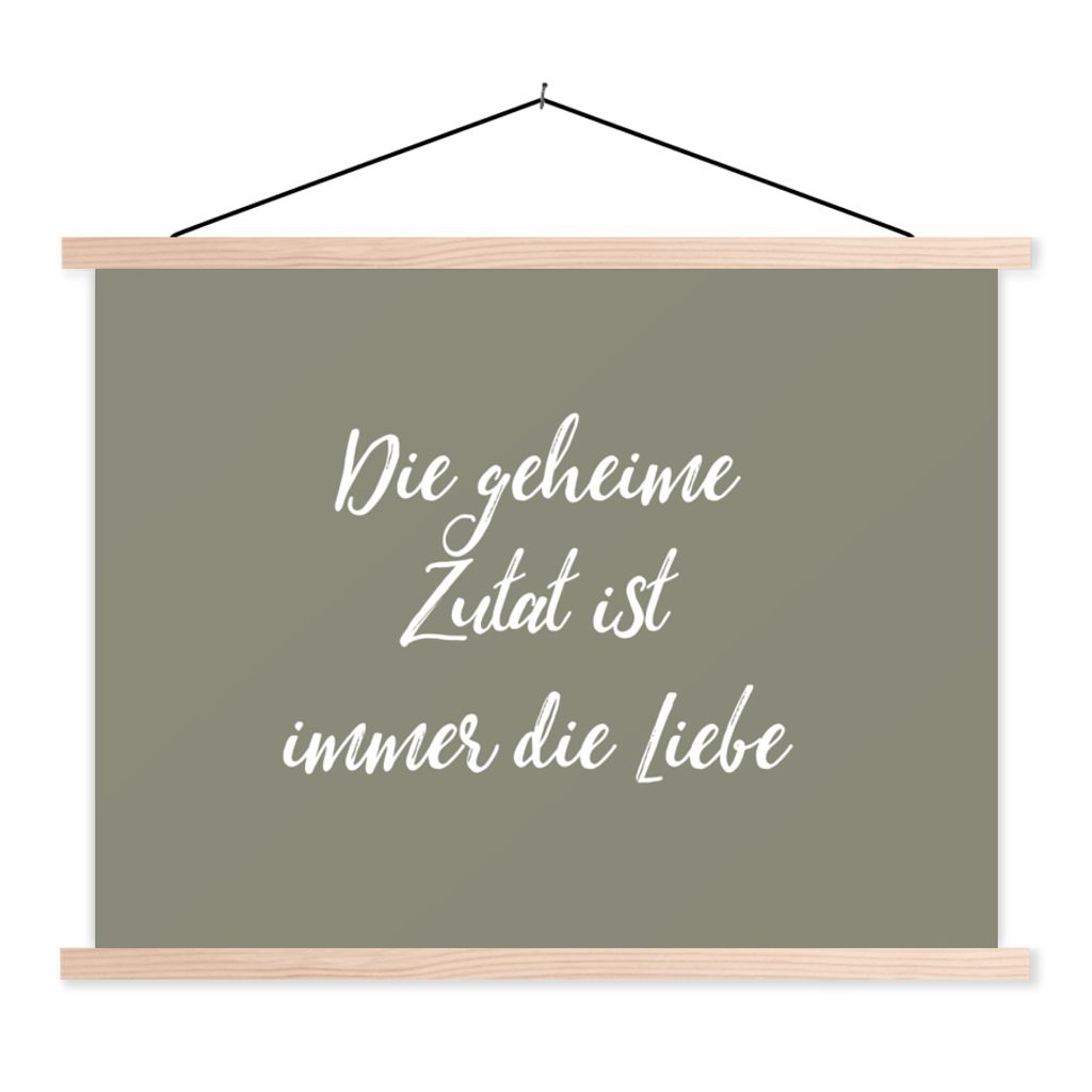 MuchoWow Textilposter Sprichwörter - Zitate - Die geheime Zutat ist immer die Liebe - Liebe 60x45 cm mit holzfarbenen Rahmen - Bild