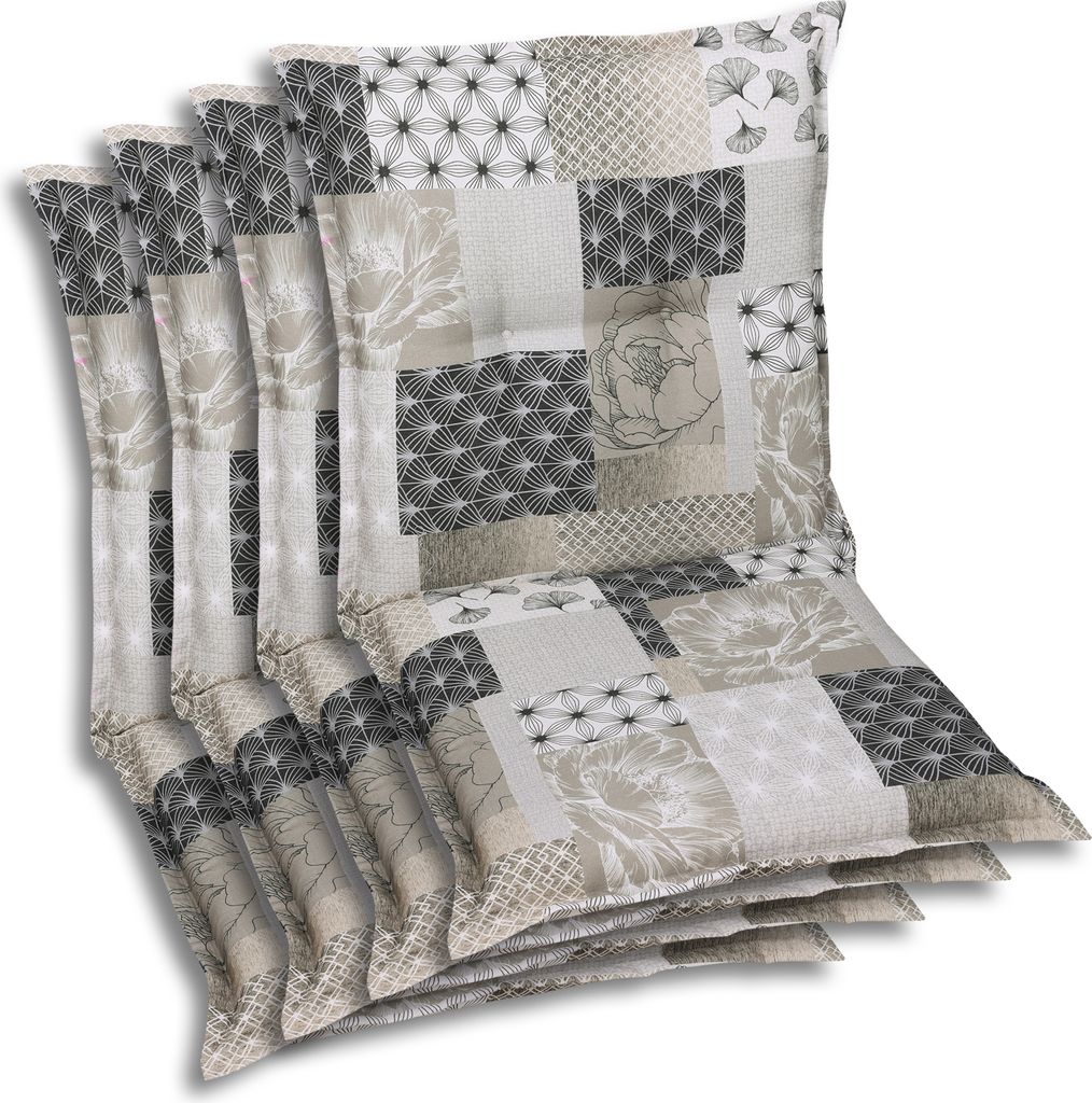 A stack of four chair cushions with a patchwork design.