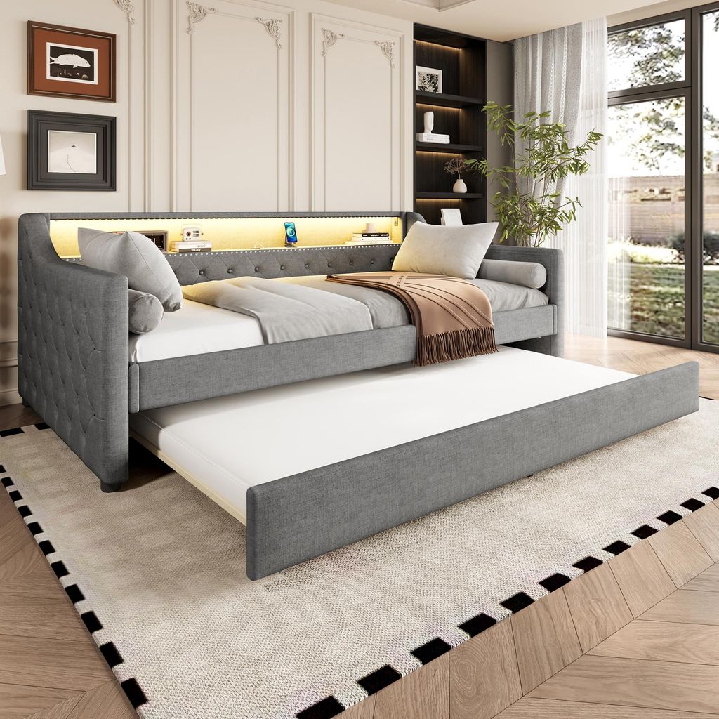 A bedroom scene with a daybed and a pull-out trundle bed.