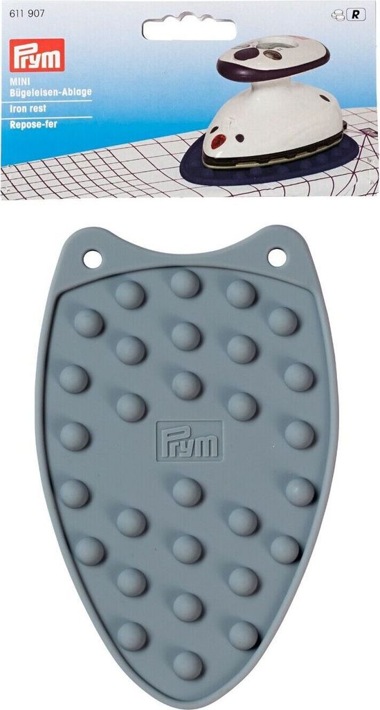 A product shot of a mini iron rest and its packaging.