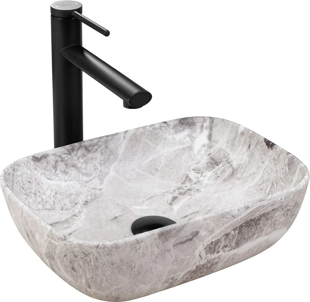 A bathroom sink and faucet.