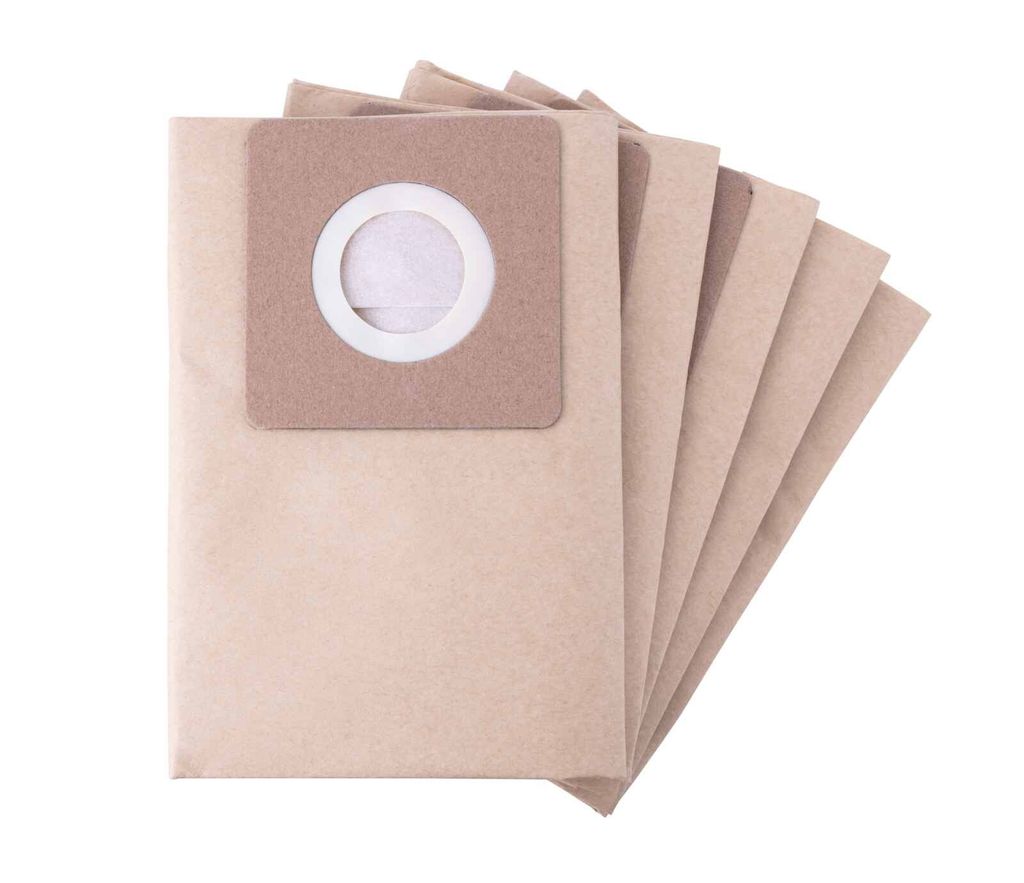 A stack of brown paper vacuum cleaner bags on a white background.