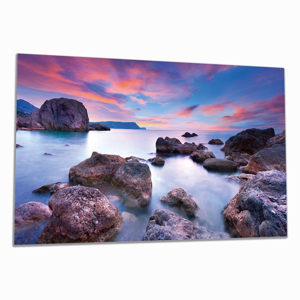 Wallario Herdabdeckplatte aus Glas, Größe 90 x 52 cm 1-teilig, Motiv Seelandschaft in blau und rot mit großen Felsen