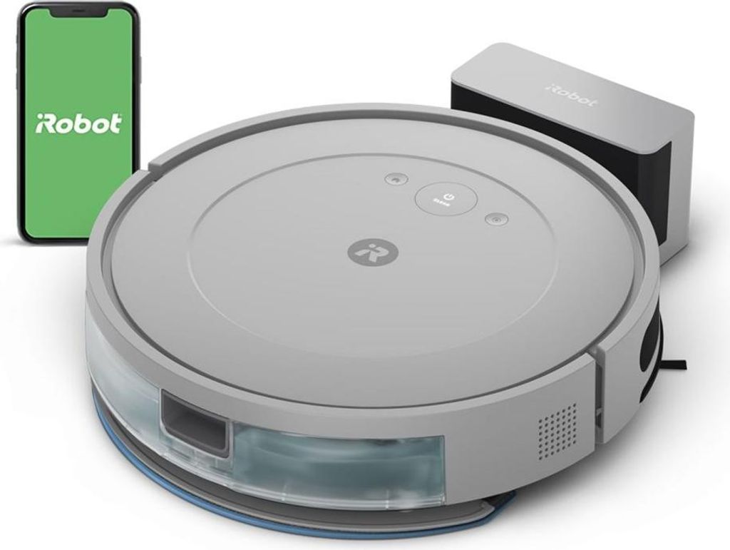 A robot vacuum cleaner, its charging dock, and a smartphone displaying a green screen with the word 'Robot' on it.
