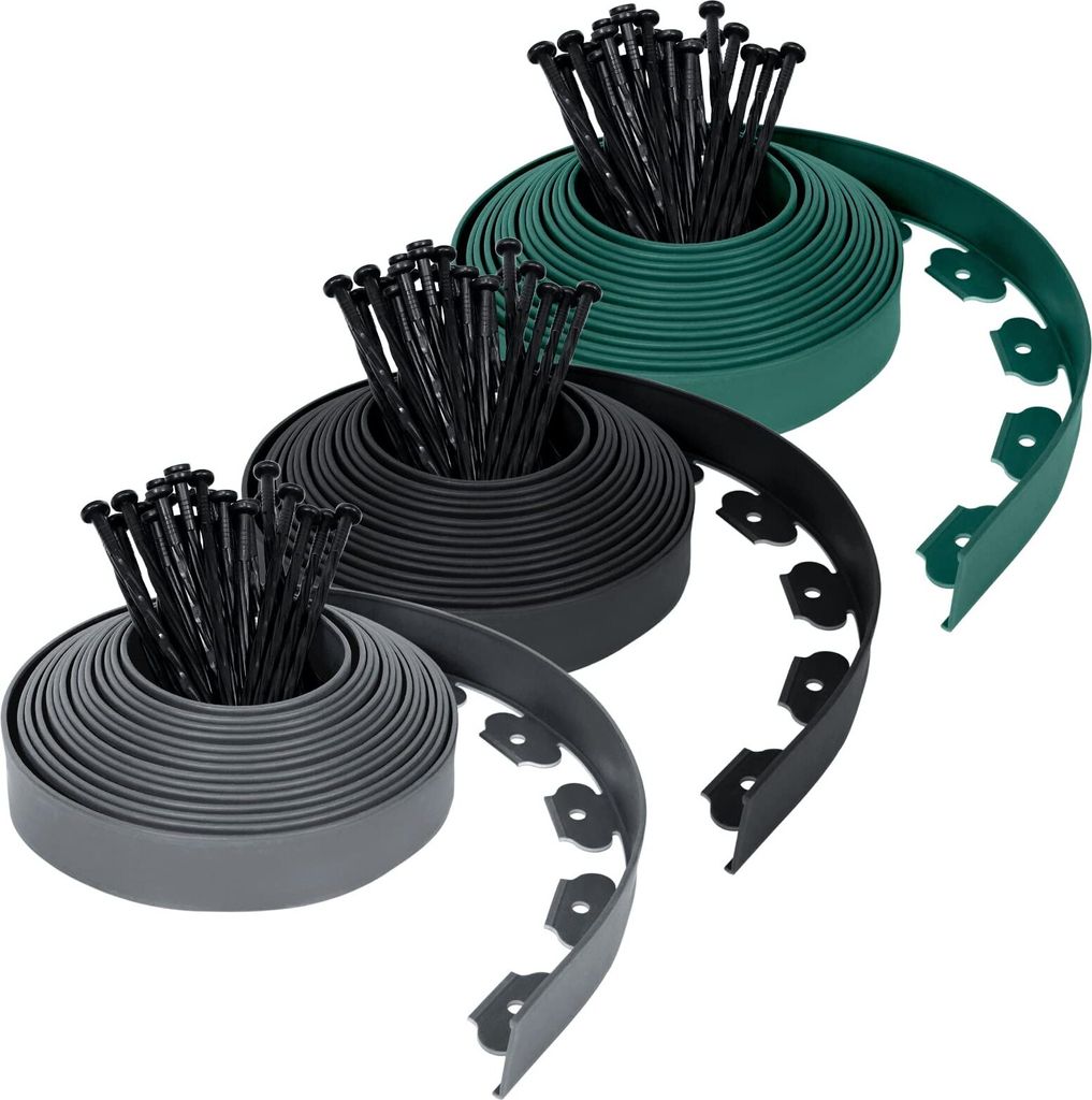 Three rolls of garden edging in different colors (green, black, and gray) with stakes.