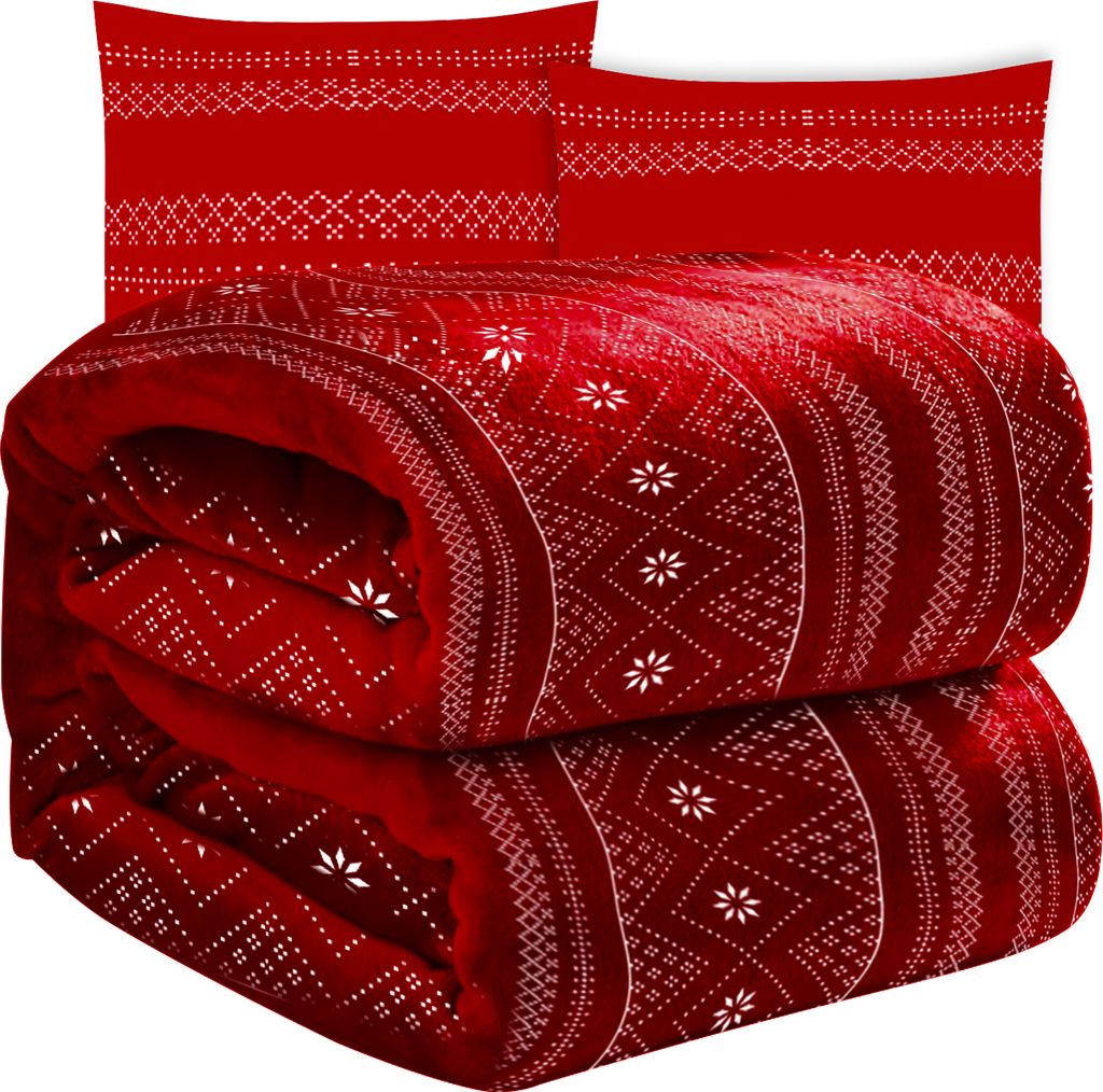 A folded red blanket and two pillowcases with a white geometric pattern, stacked on top of each other.
