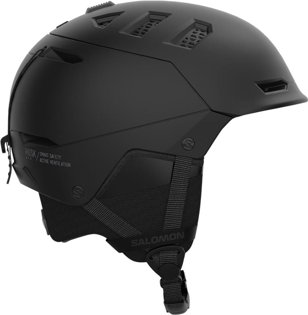 A black ski helmet is shown from a side angle against a white background.