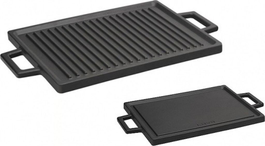 Two cast iron grill plates on a white background.
