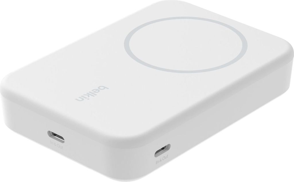 A white Belkin BoostCharge Pro power bank with a magnetic charging circle on top and two USB-C ports on the side.
