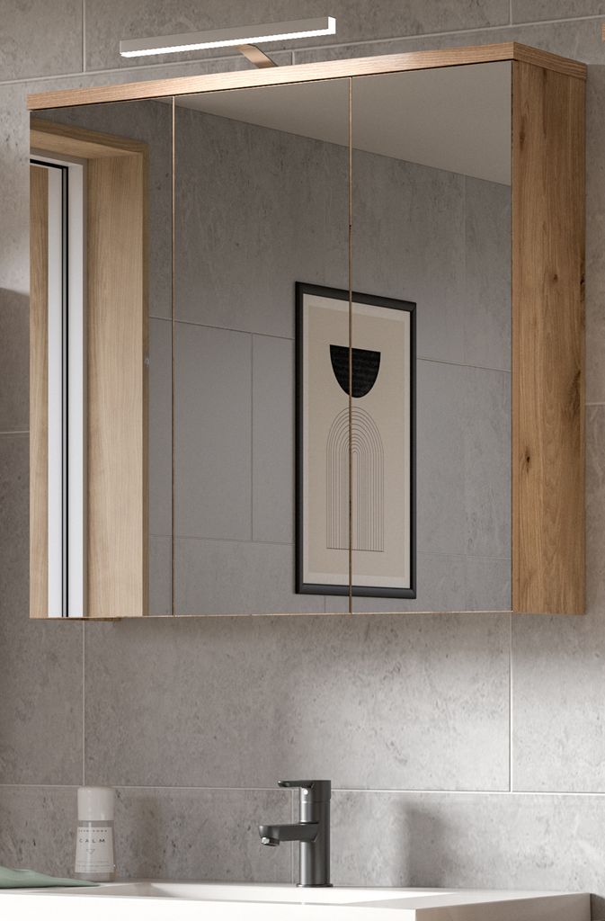 A modern bathroom vanity with a mirrored cabinet and a sink with a faucet.