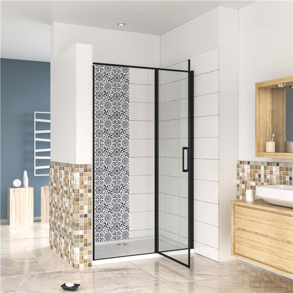 A modern bathroom with a shower enclosure, vanity, and sink.