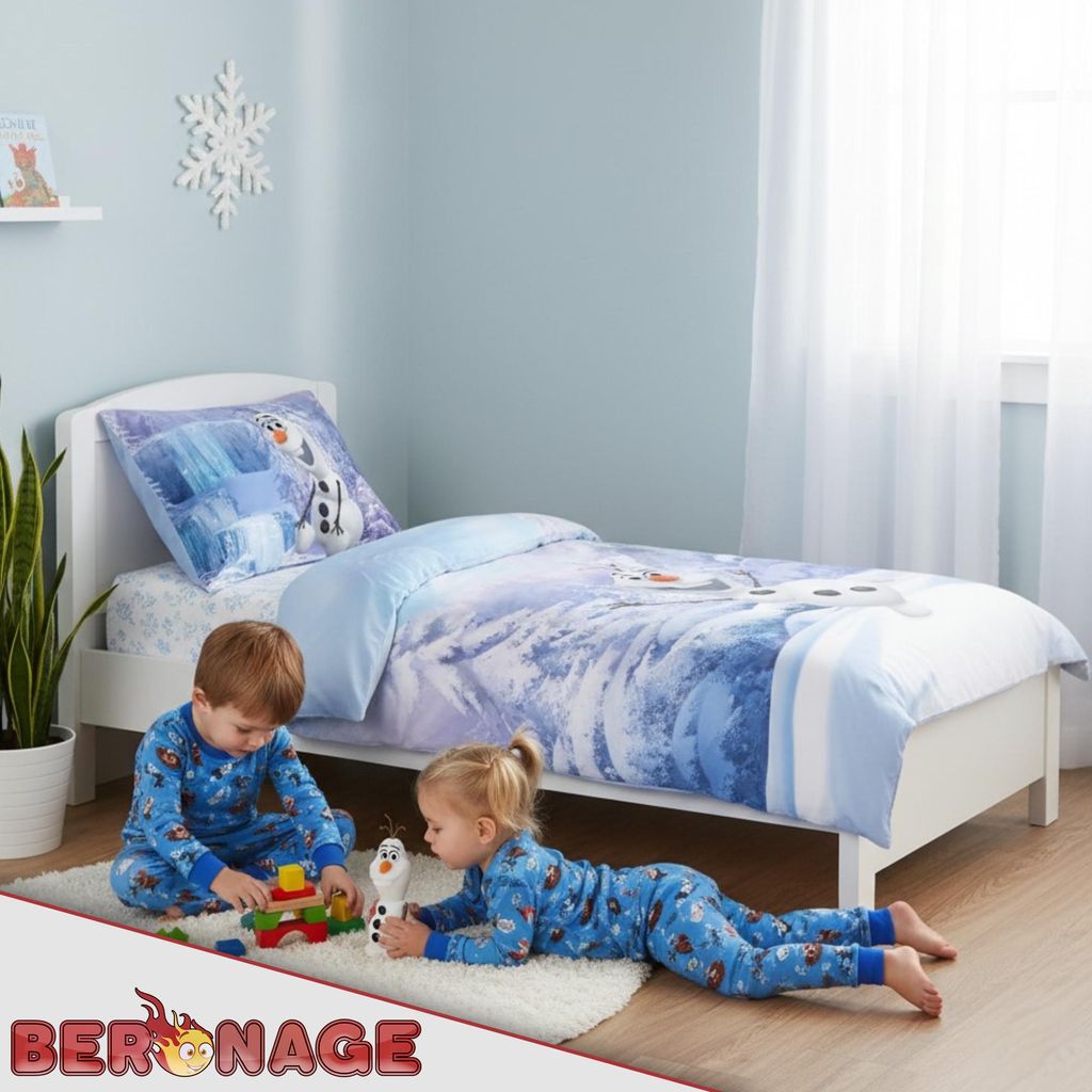 Two children in pajamas playing on the floor in a bedroom with a Frozen-themed bed.