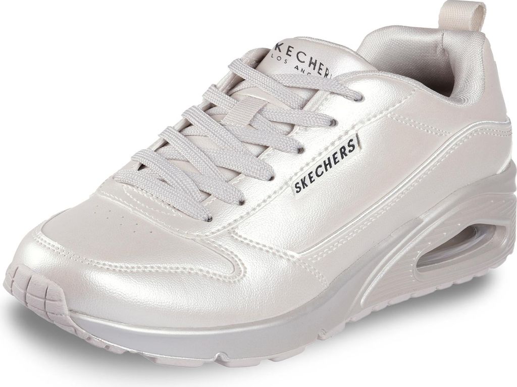 A studio shot of a white Skechers sneaker.