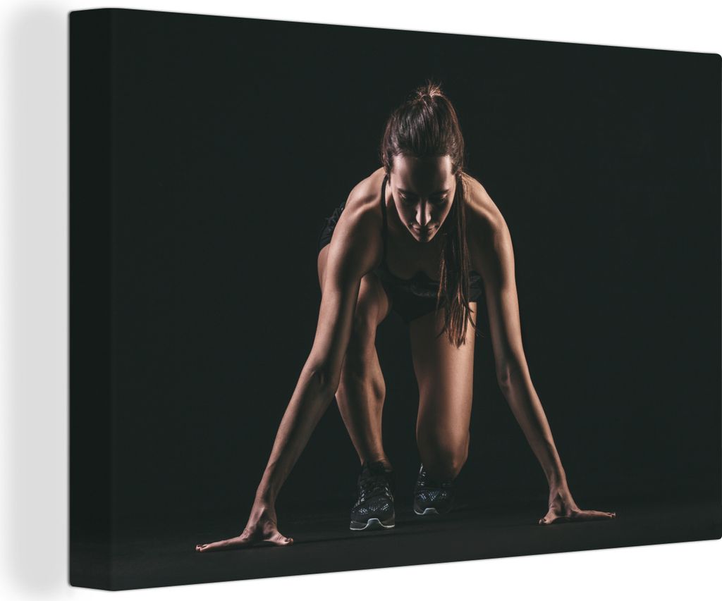 OneMillionCanvasses - Leinwandbilder - 140x90 cm, Weibliche Athletin auf schwarzem Hintergrund, Wandbilder Kunstdruck Wanddekoration - Foto auf L...
